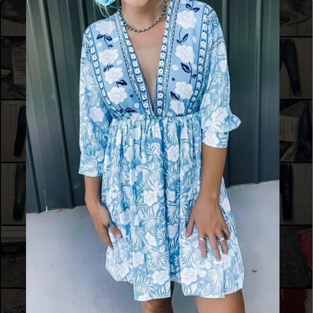 Blue floral dress. Has tie in back. Low cut